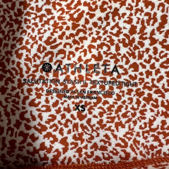 Athleta Salutation Stash II Textured Tight Rust Micro Cheetah Print Leggings - Picture 7 of 9